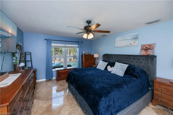 Master bedroom looking out to the pool