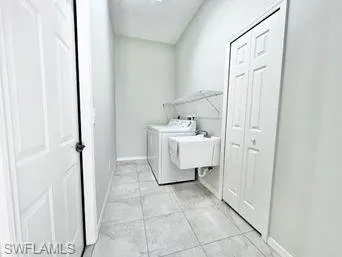 Laundry area featuring washing machine and dryer