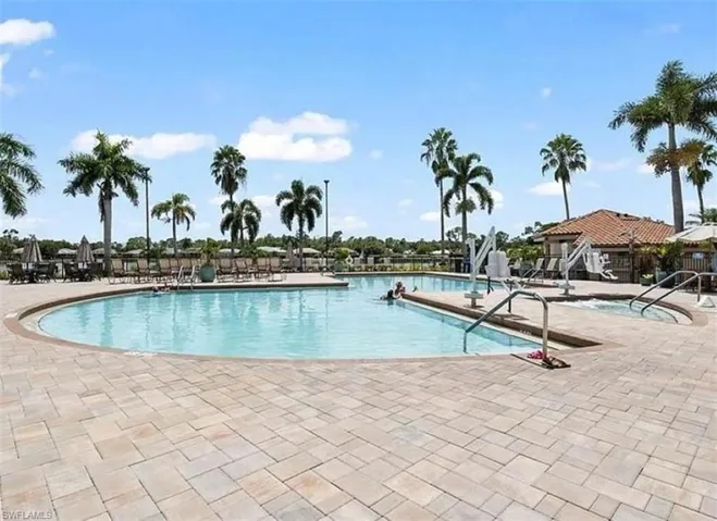 View of swimming pool with a patio area