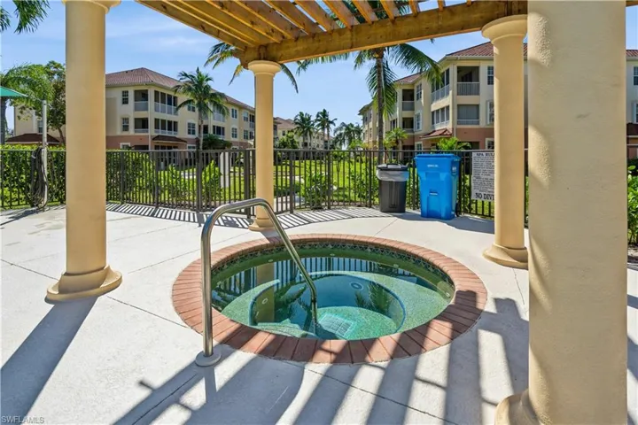 View of patio featuring a hot tub