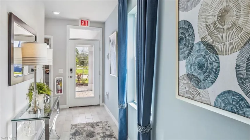 Foyer featuring baseboards