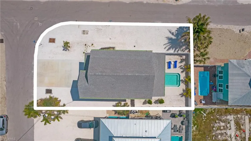 Aerial overview of property's location with property parcel outlined