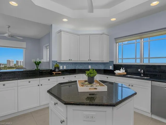 Wonderful light, abundant storage and plenty of prep surface area.  Enjoy mingling with your guests when entertaining.