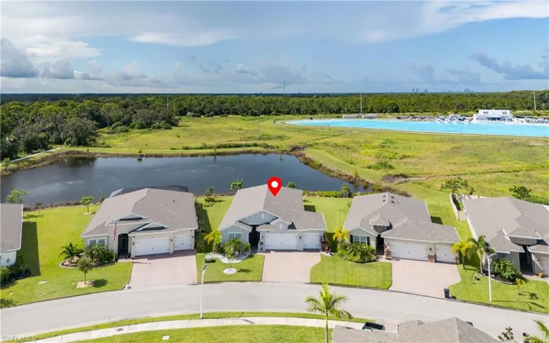 Aerial view of residential area with a large body of water