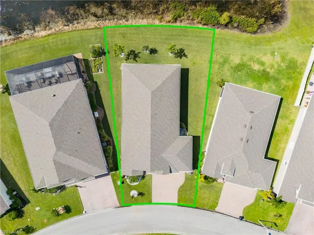 Aerial perspective of suburban area with property parcel outlined