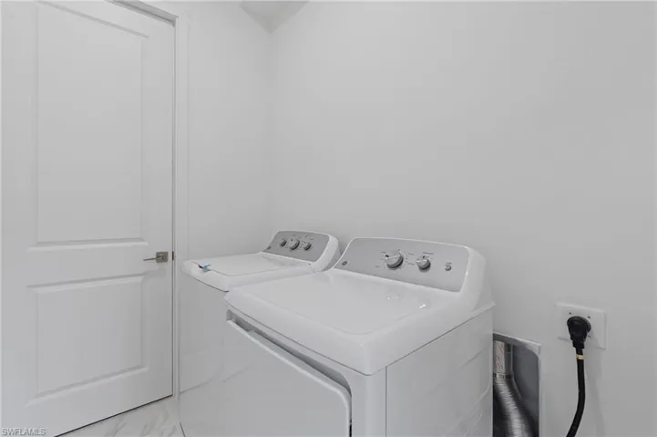 Laundry area with separate washer and dryer