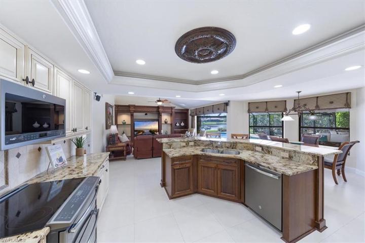 Kitchen with view of the pool and lake