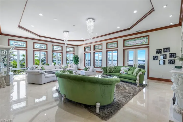Community lobby with crown molding and recessed lighting