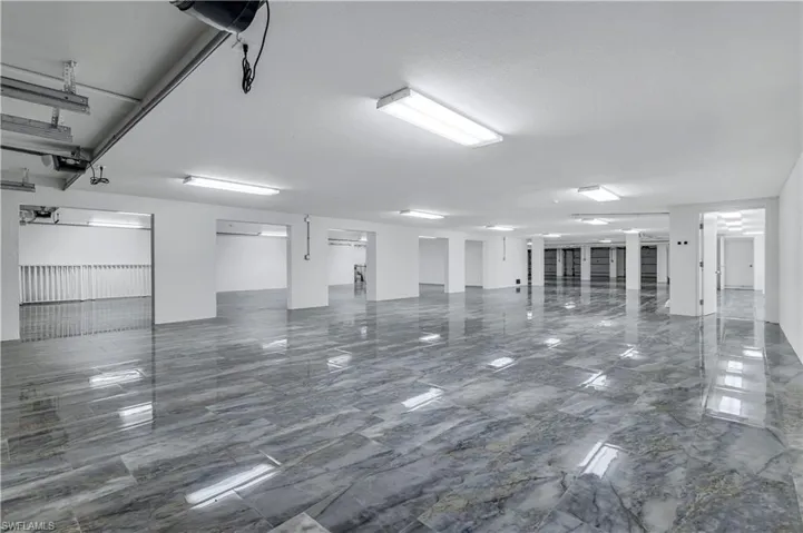 View of garage where you can fit up to 30 vehicles.  Vehicle sizes will impact how many can fit.