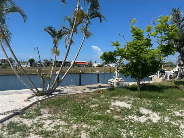 Water view featuring a dock
