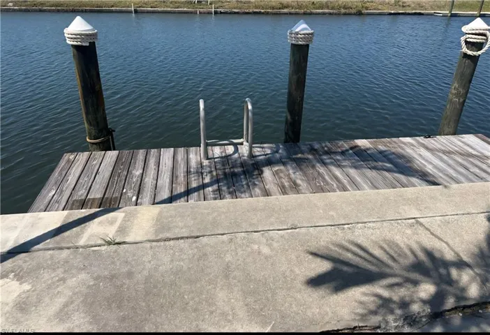 Dock featuring a water view
