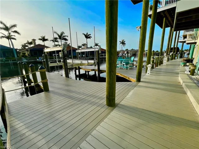 New Deck and Dock area with water access and brand new Neptune 20k boat lift constructed by HONC 5/2025