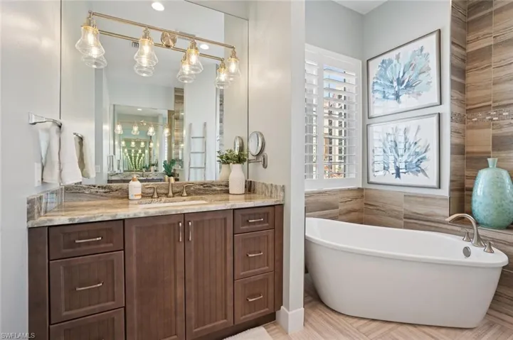 Master Bathroom with a beautiful soaking tub and 2 separate vanities