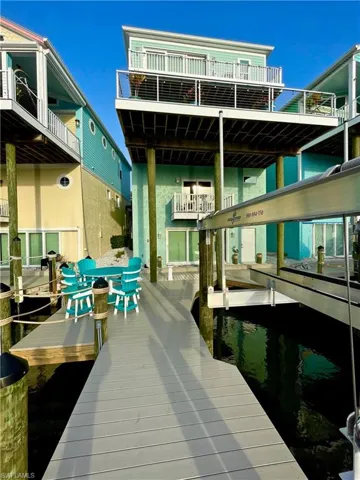 New Deck and Dock area with water access and brand new Neptune 20k boat lift constructed by HONC 5/2025