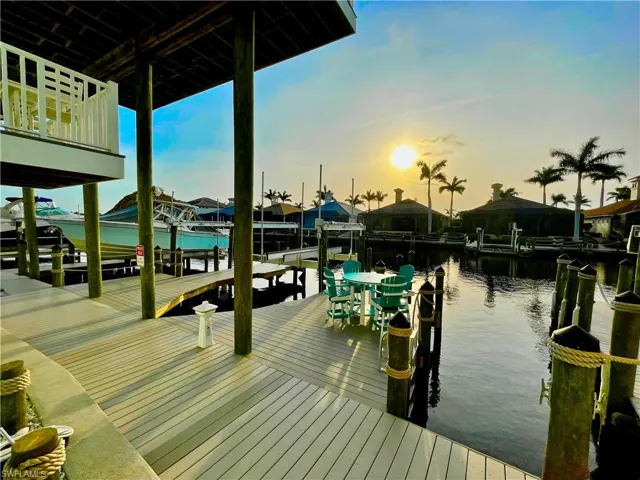 New Deck and Dock area with water access and brand new Neptune 20k boat lift constructed by HONC 5/2025