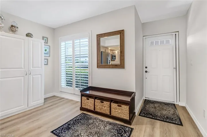 Entry with light wood-type flooring