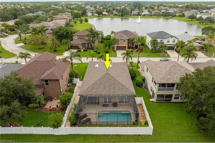 Aerial view of home and neighborhood.