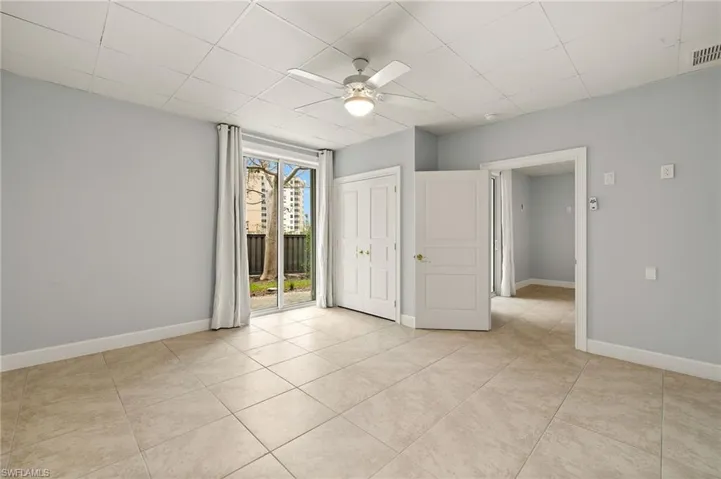 4th Bedroom featuring ceiling fan and light tile patterned floors