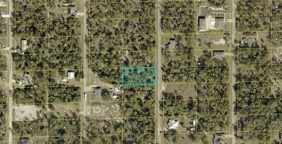Aerial overview of property's location featuring property parcel outlined