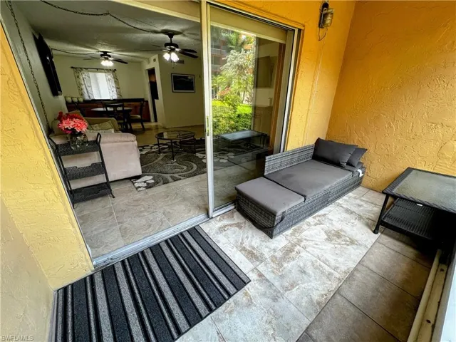 View of patio / terrace with a ceiling fan