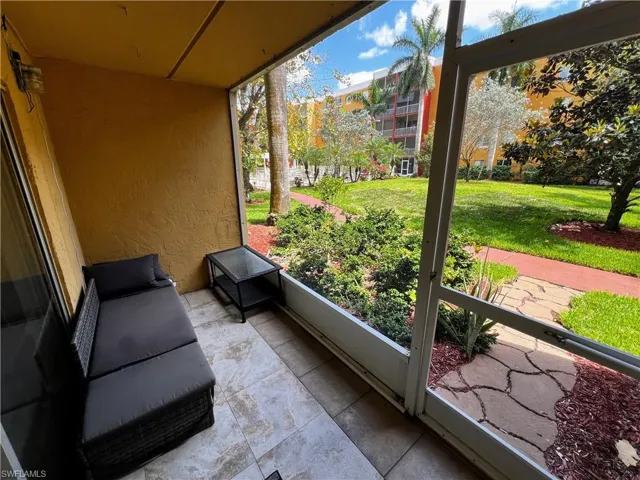 Unfurnished sunroom featuring a wealth of natural light