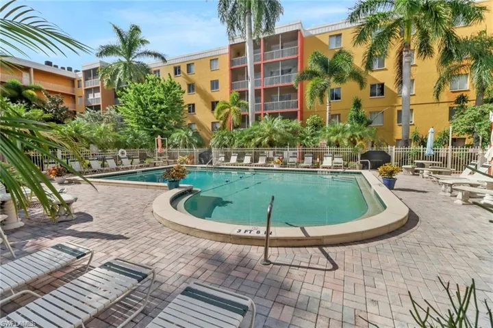 Pool featuring a patio area and fence