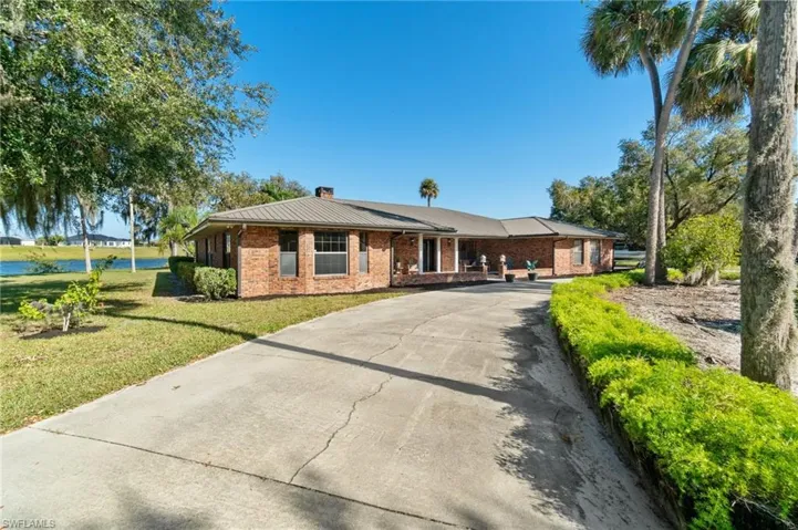 Single-story home set on nearly 3 acres, offering the perfect canvas to create your own dream space