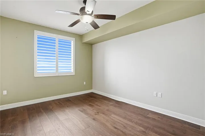 3rd bedroom featuring hardwood flooring and ceiling fan