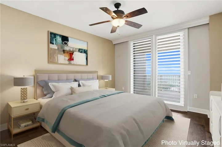 Virtually Staged 2nd bedroom featuring hard wood flooring, ceiling fan, and a closet