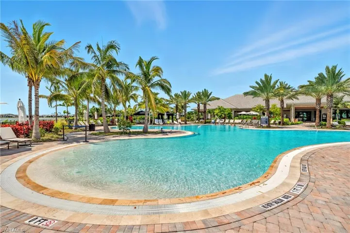Community pool with a patio area