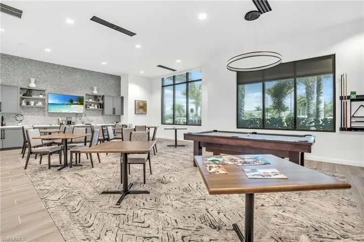 Playroom featuring light wood-type flooring, recessed lighting, and billiards