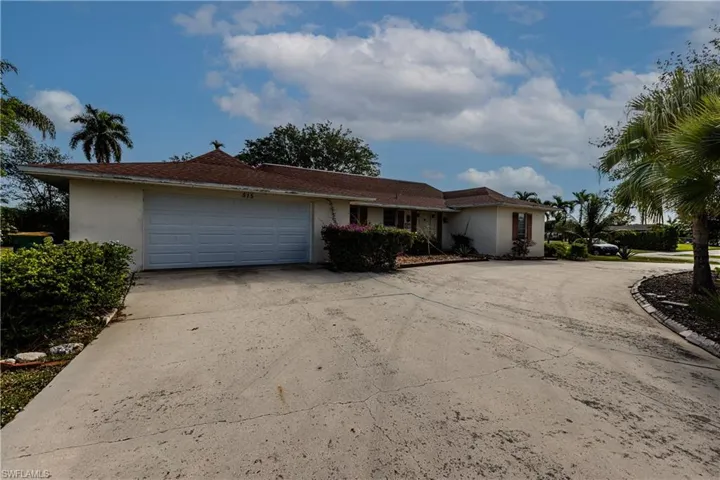Ranch-style house with a garage