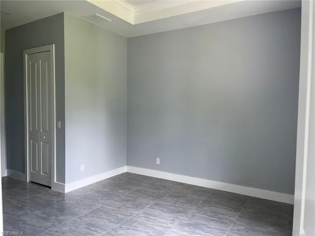 Unfurnished room with tile patterned flooring