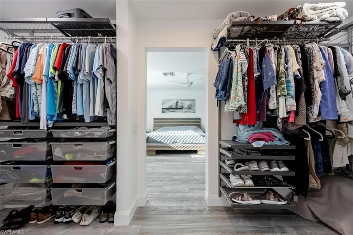 Spacious closet featuring wood-type flooring