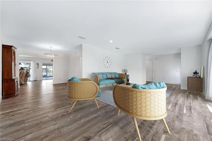 Virtual Photo-Living room with hardwood / wood-style floors