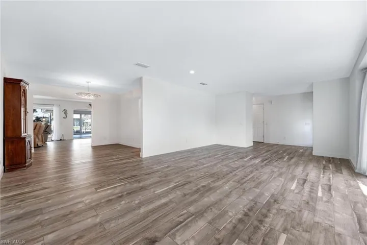 Unfurnished room with wood-type flooring
