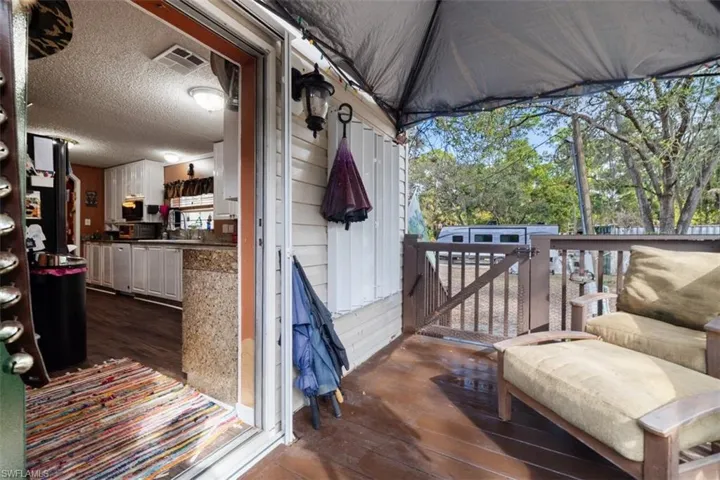 Wooden terrace with a sink