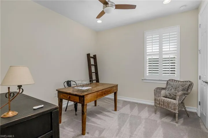 Carpeted office space featuring ceiling fan or 2nd bedroom