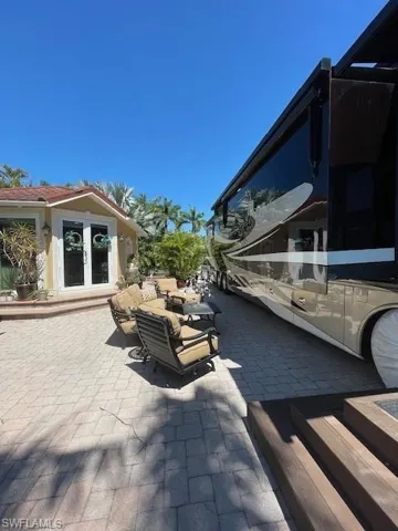 View of patio / terrace with exterior kitchen and french doors