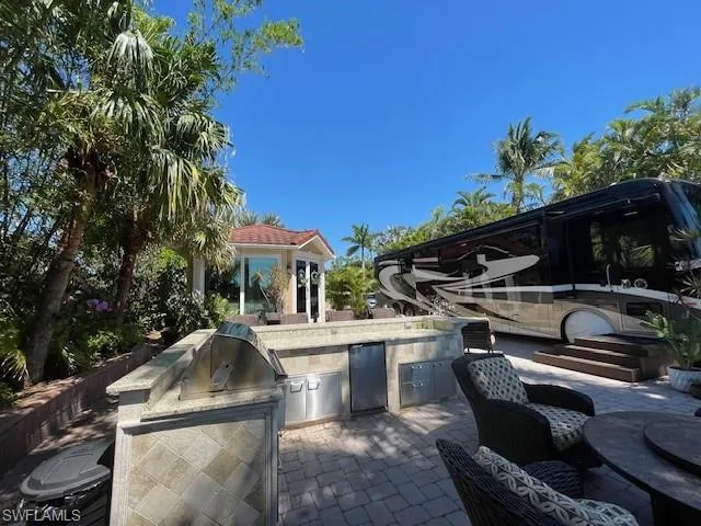 View of patio / terrace featuring an outdoor kitchen