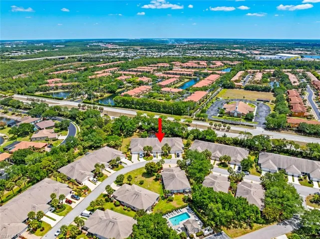 Bird's eye view with a water view and a residential view