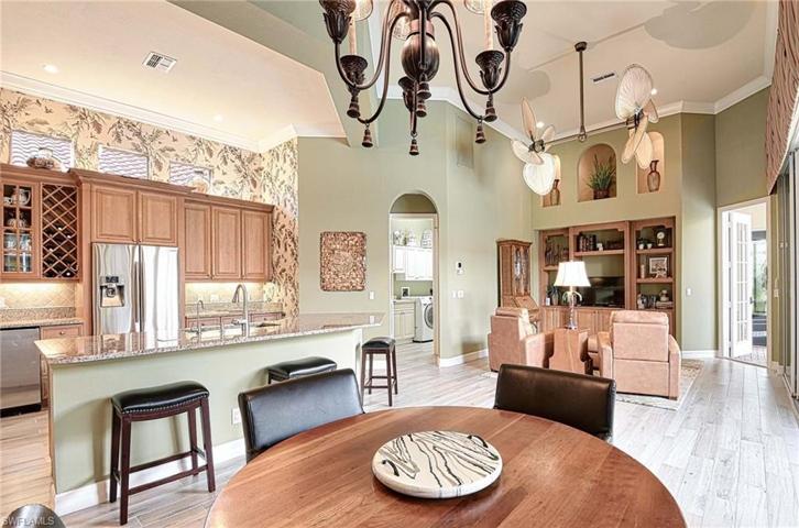 Porcelain wood tile in kitchen, family room, and pantry.