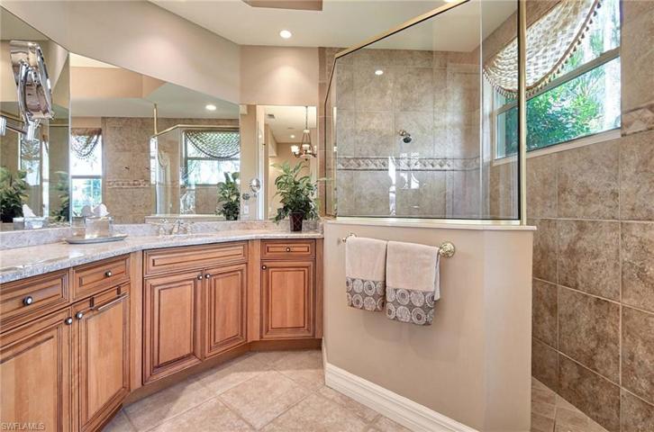 Separate sink areas in primary bath.