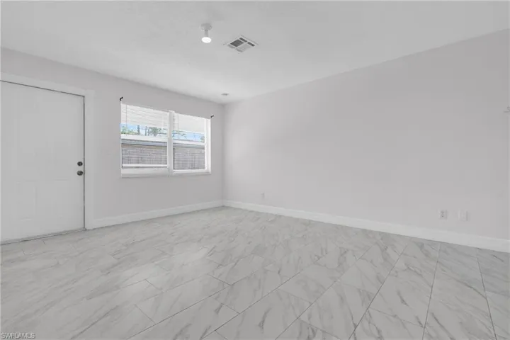 Empty room with baseboards