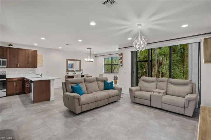 Tiled open living and dining area