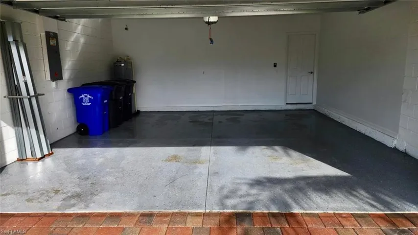 Garage with concrete block wall and electric panel