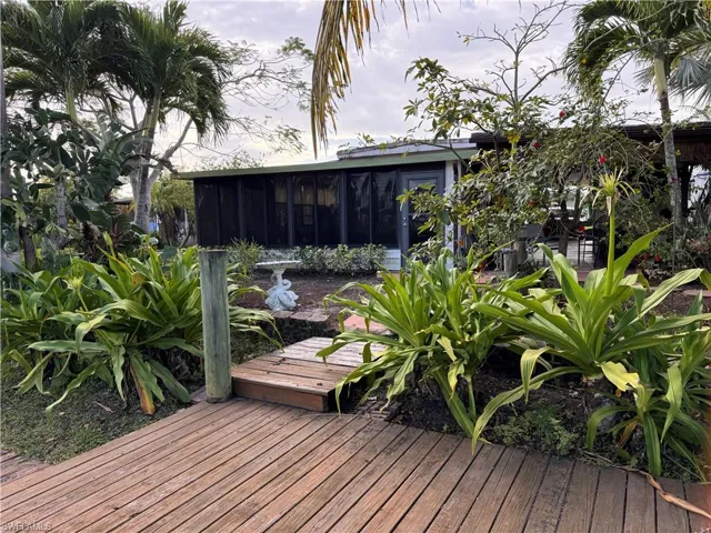Wooden terrace with a sunroom