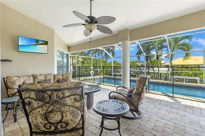 Lanai facing the pool and canal views