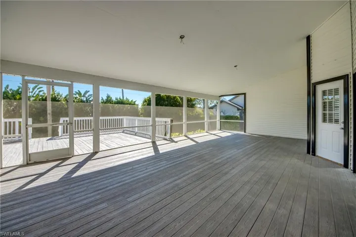Wooden terrace with a sunroom