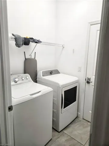 Laundry room featuring washing machine and dryer